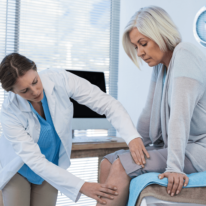 Doctor Examining Patient Knee 1 Min