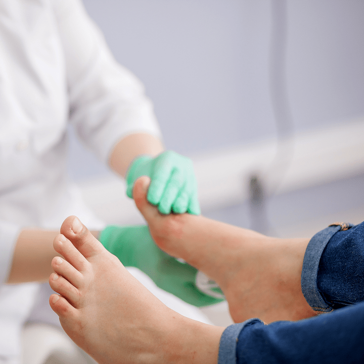 Doctor Podiatrist Examines Foot 1 Min